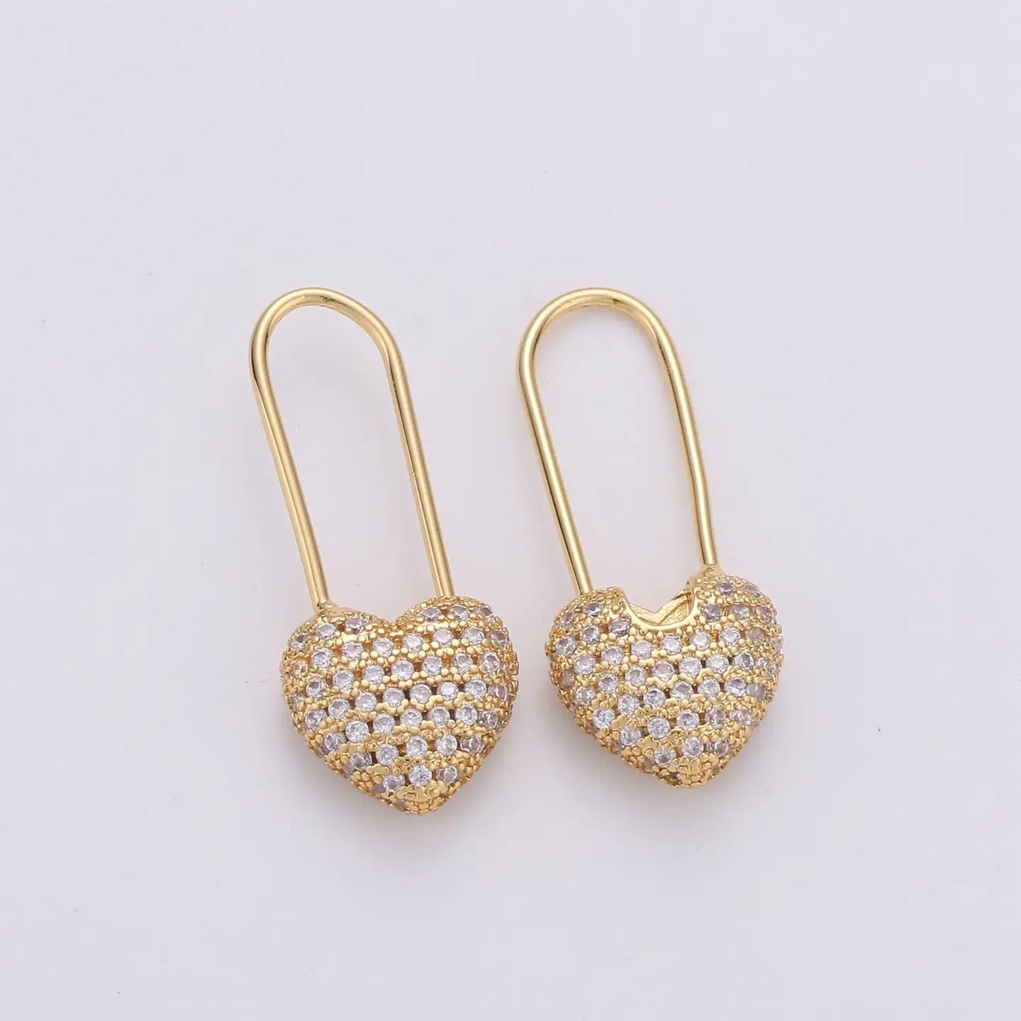 Gold heart pin